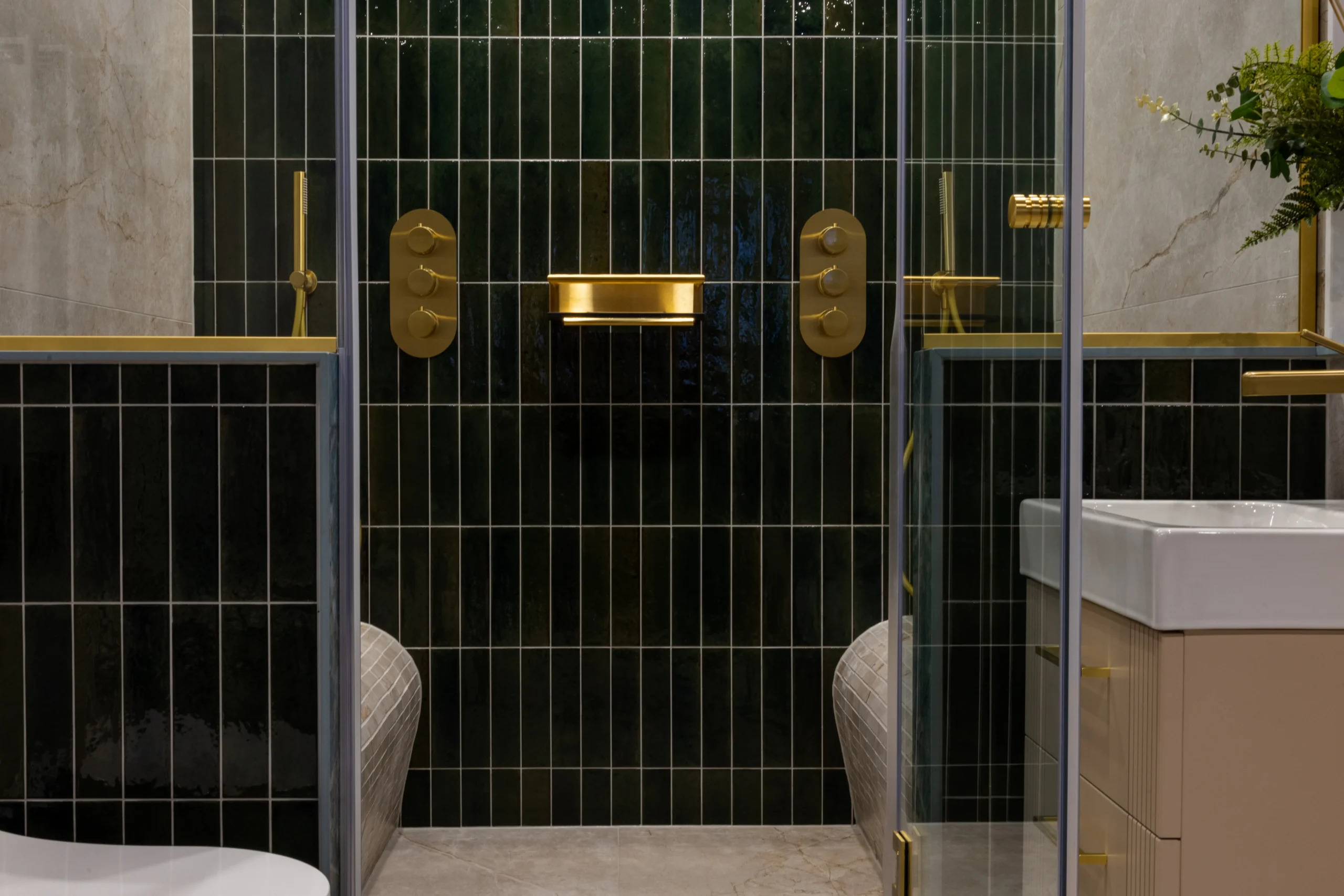 Fully tiled wet room with an open, screen-free shower area on display in the Newlook Tiles and Bathrooms Dublin showroom