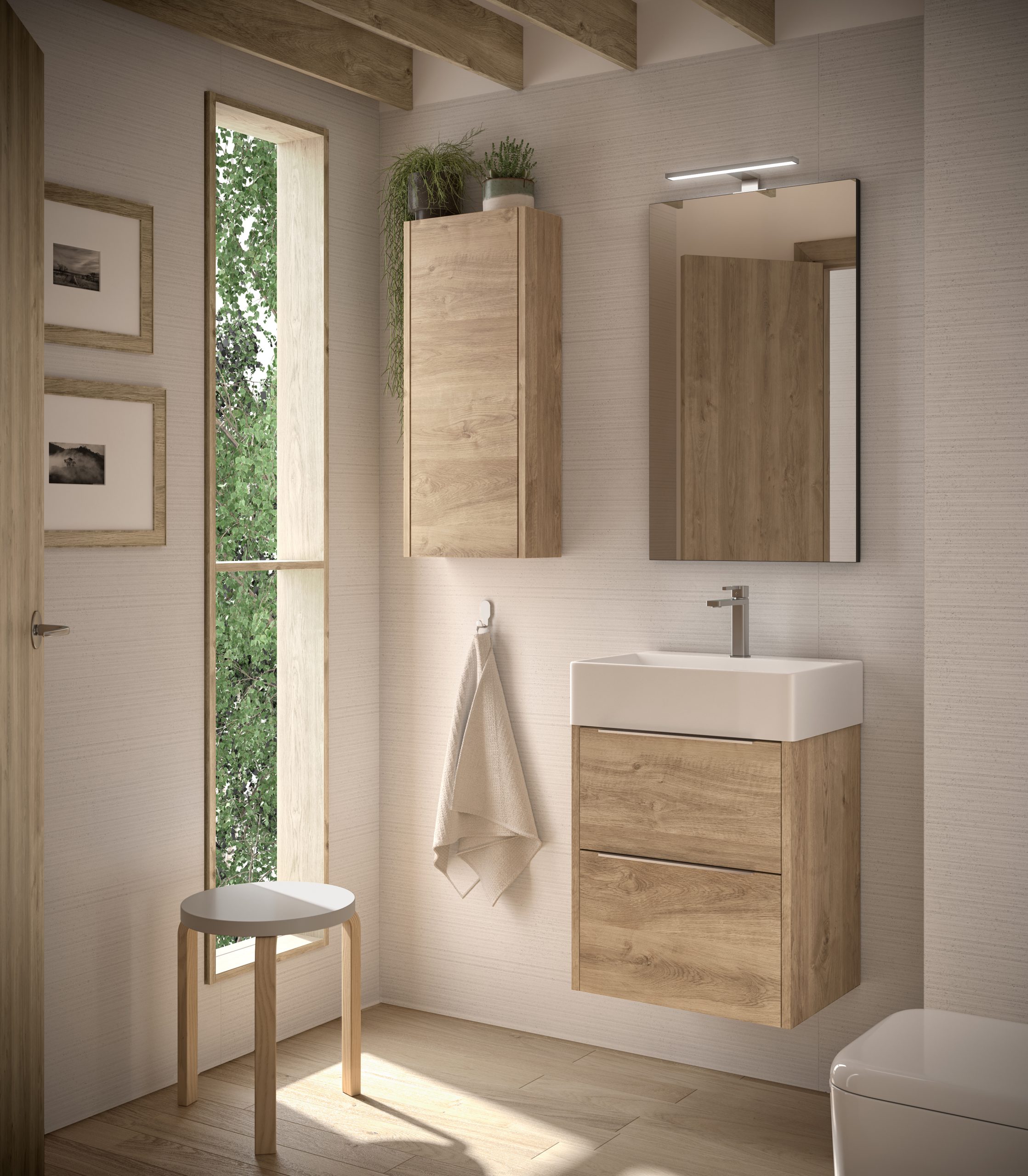 Light oak 500mm wall hung vanity with white basin and tall matching oak cabinet in a Scandi bathroom