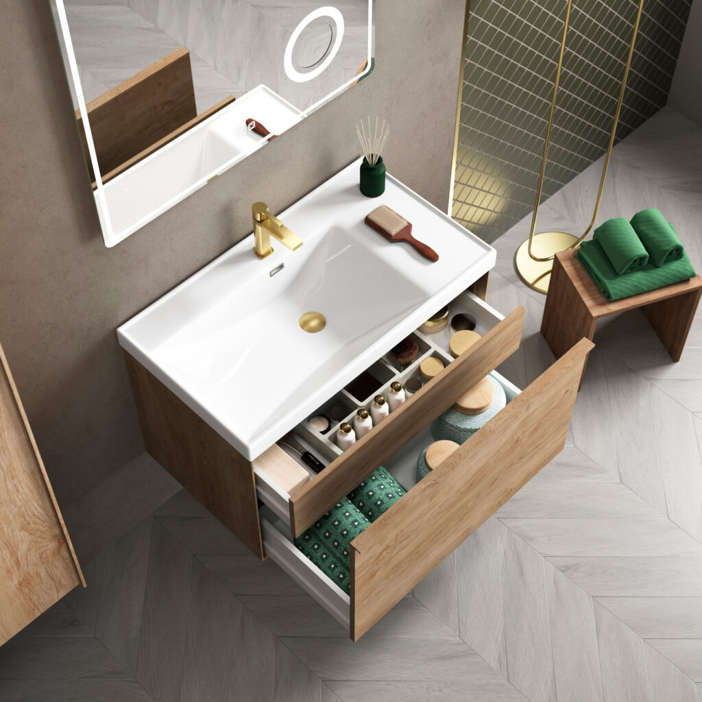 Overhead view of oak wall hung vanity with open drawers showing interior storage