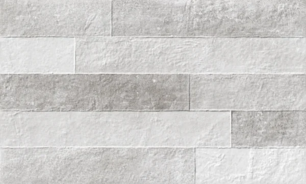 Grey relief décor tile with stacked stone brick-effect surface texture
