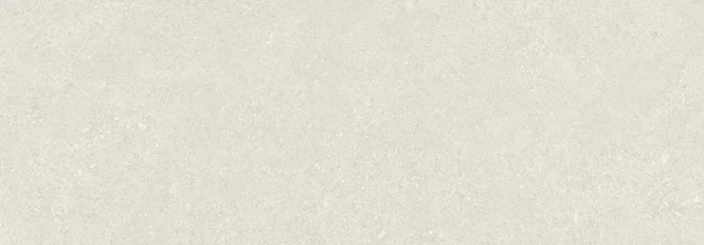 White ceramic tile surface with subtle grey speckled stone-look finish