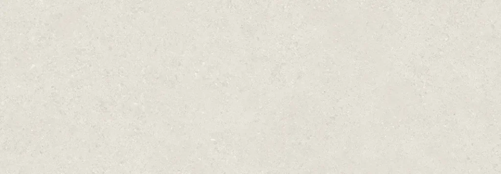 Pale off-white ceramic tile with a smooth fine-grained stone-look surface finish