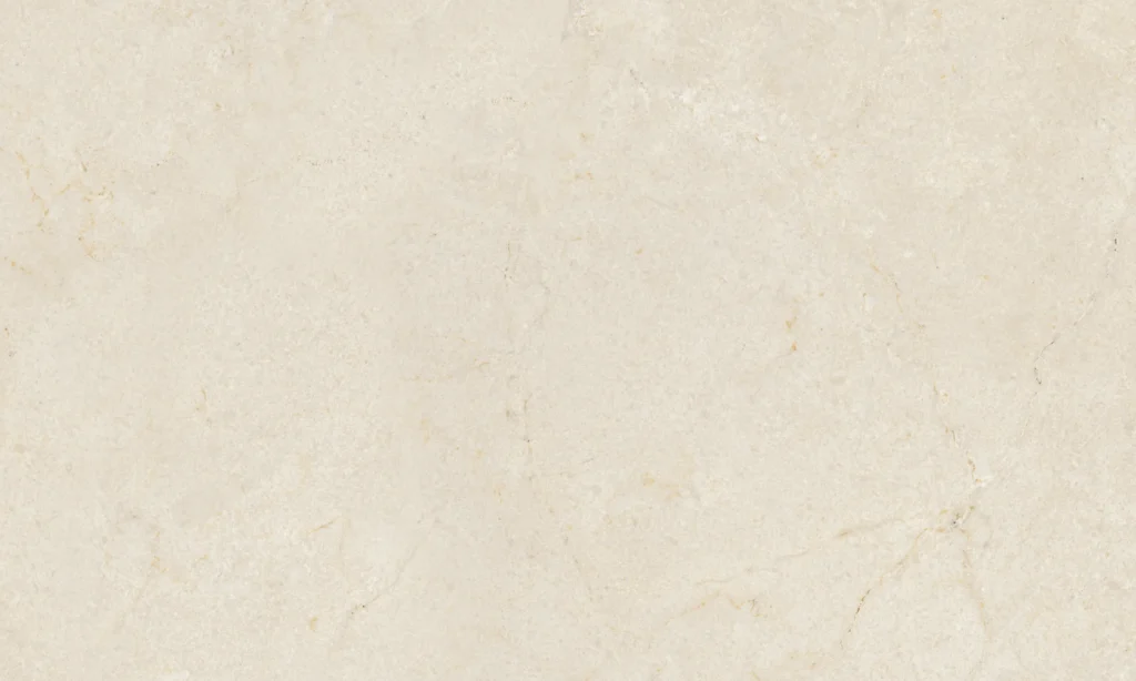 Glossy ivory ceramic wall tile with soft natural marble-look veining