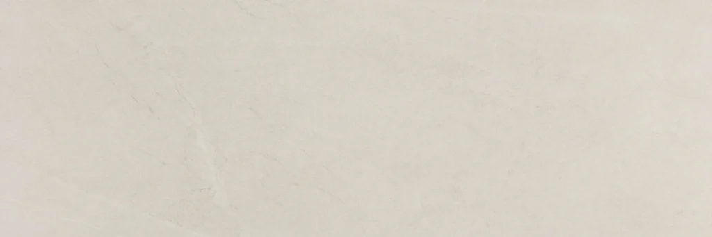 Ivory matt ceramic wall tile with delicate linear stone-effect markings