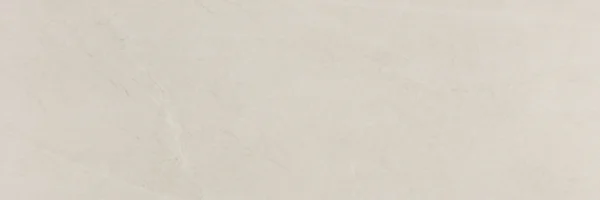 Ivory matt ceramic wall tile with delicate linear stone-effect markings