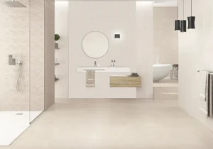 Matt ivory ceramic wall tiles with textured diamond relief in airy bathroom setting