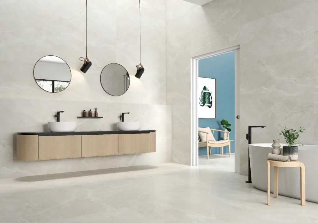 Spacious bathroom featuring pale sand gloss marble-effect tiles on walls and floor