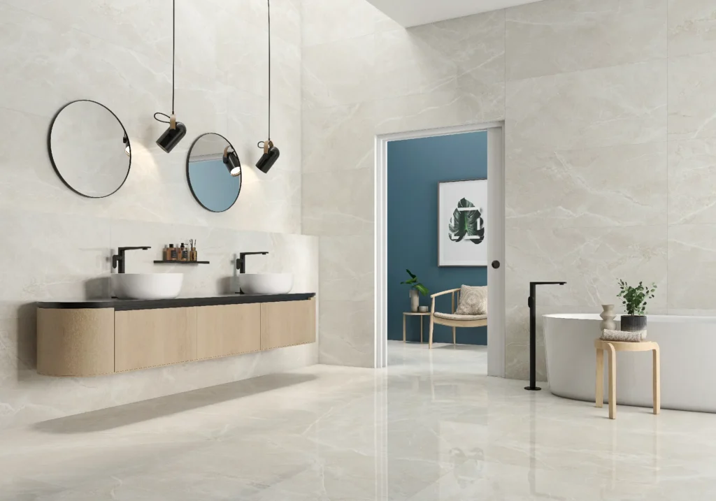 Bright bathroom with glossy sand marble-effect wall and floor tiles, double basin vanity