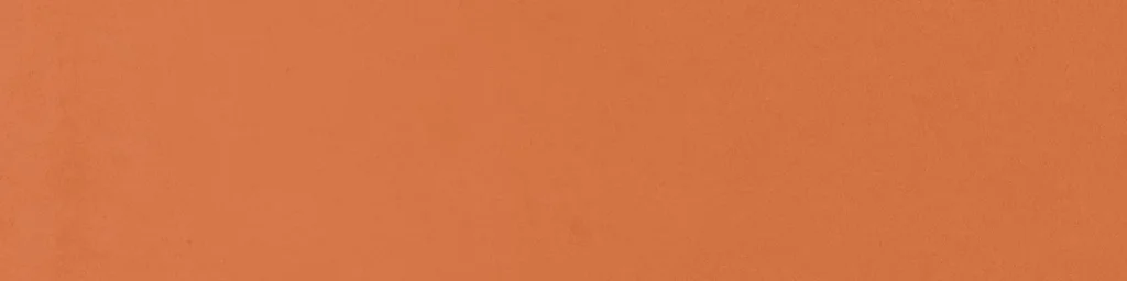 Plain flat terracotta orange ceramic tile with smooth matte finish