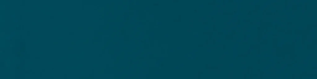 Single deep blue-teal ceramic wall tile with smooth matte surface