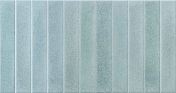 Light green ceramic wall tile with raised vertical stripe relief