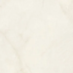 Close-up of a cream porcelain tile with soft marble-effect veining