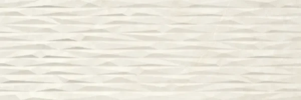 Cream décor wall tile with geometric folded angular relief pattern across the surface