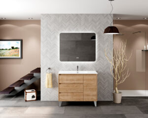 Oak freestanding vanity unit with three drawers against herringbone tiled feature wall