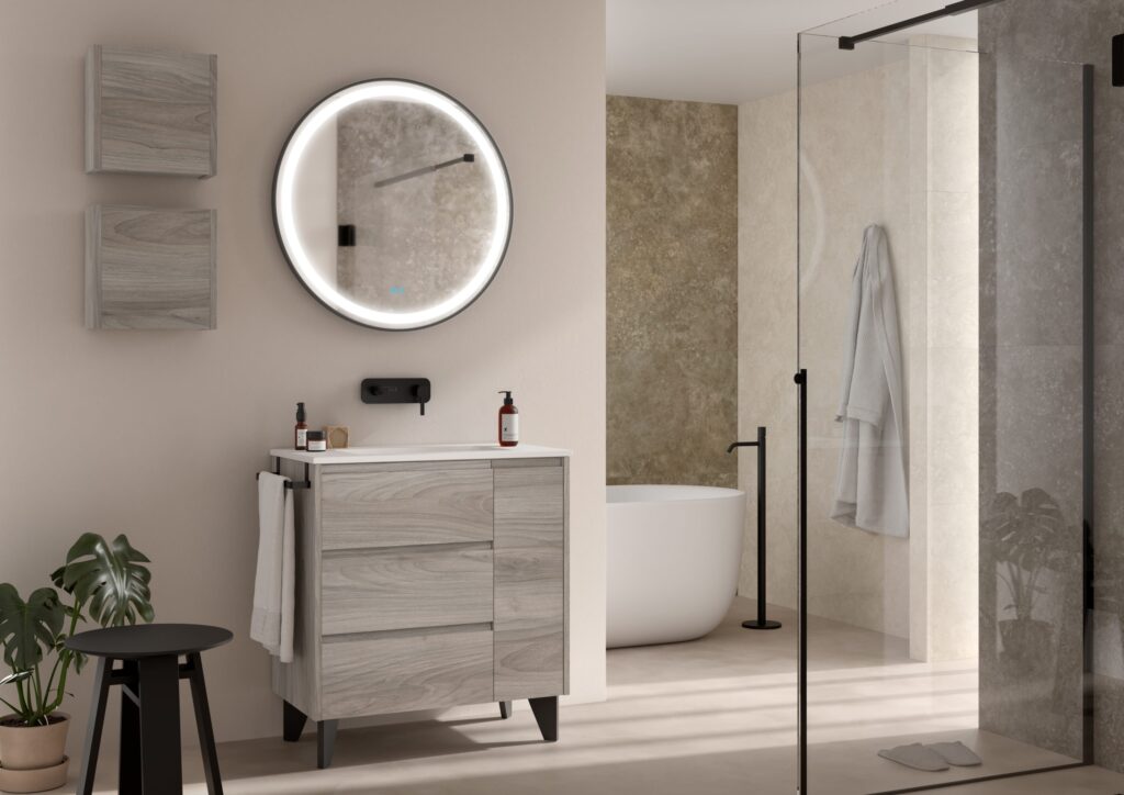 Grey wood effect freestanding vanity unit with round LED mirror beside walk-in shower
