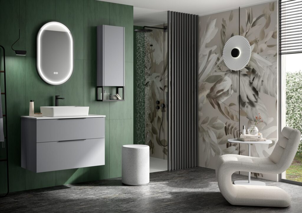 Light grey wall hung vanity with countertop basin against bold green tiled wall