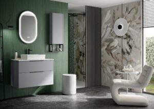 Light grey wall hung vanity with countertop basin against bold green tiled wall