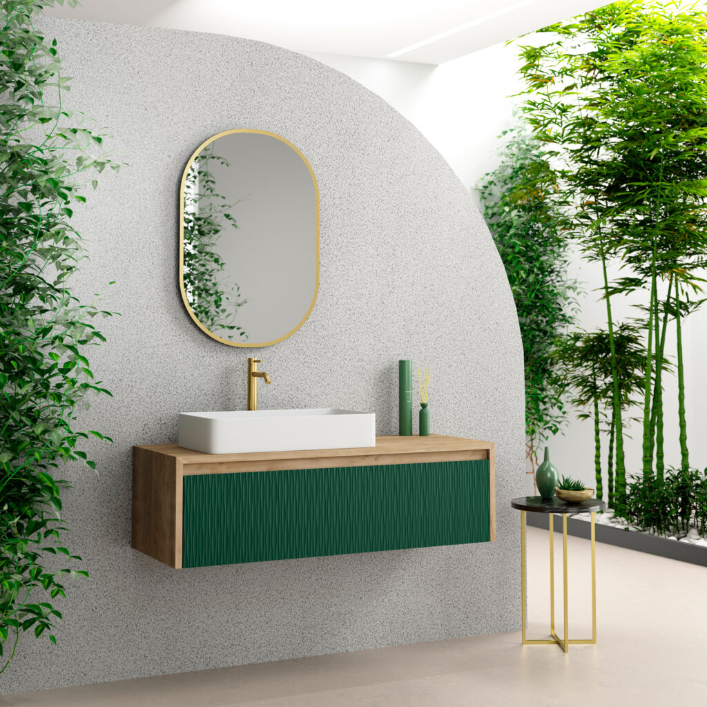 Green ribbed drawer vanity with oak top and oval gold-framed mirror