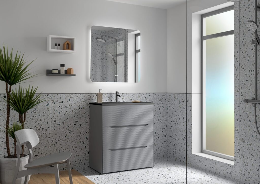 Dark grey ribbed 800mm vanity unit with black basin beneath a square LED mirror in a terrazzo bathroom