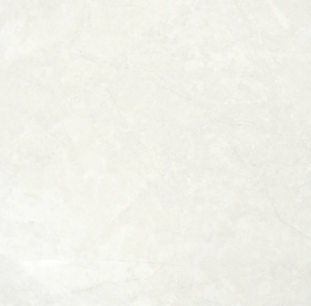 Close-up of a square white marble-effect porcelain tile with soft grey clouding