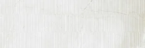 White ribbed marble-effect decor tile with fine vertical grooves and subtle veining