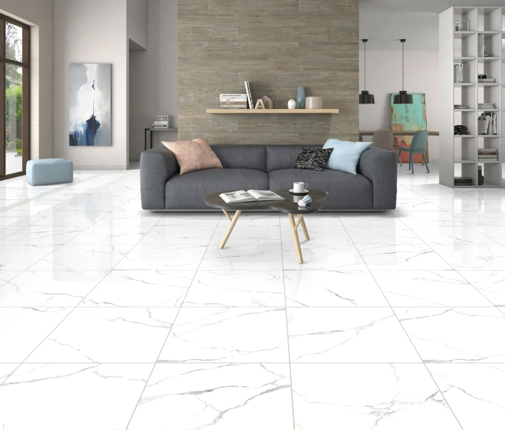 Polished white marble-effect porcelain floor tiles in a bright open-plan living room