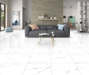 Polished white marble-effect porcelain floor tiles in a bright open-plan living room