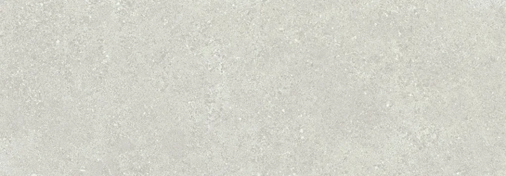 Close-up of pale grey matt porcelain tile with subtle stone texture