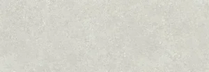 Close-up of pale grey matt porcelain tile with subtle stone texture