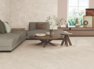 Cream stone-effect porcelain floor tiles in a contemporary lounge with wooden furniture