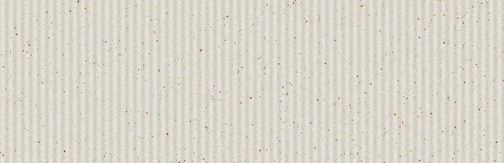 White ribbed porcelain décor tile with fine vertical ridges and speckled detail