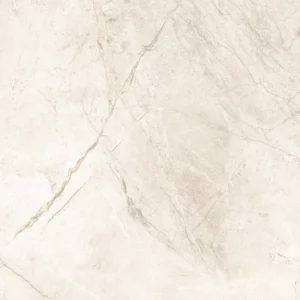 Ivory matt porcelain tile showing soft diagonal grey veins across a cream surface