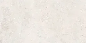 Close-up of white matt stone-effect porcelain tile with subtle speckled texture