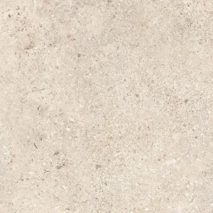 Warm beige matt porcelain tile with scattered stone aggregate detailing throughout