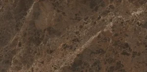 Close-up of dark brown marble-effect porcelain tile with gold veining
