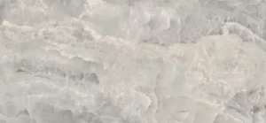 Polished porcelain tile with soft grey and white cloud-like onyx effect finish