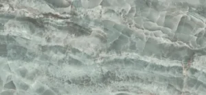 Polished jade-green onyx effect porcelain tile with translucent layered veining