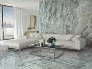 Contemporary living room clad in teal-green polished onyx effect floor and feature wall tiles