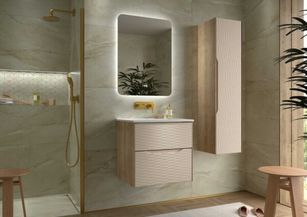 Beige ribbed 600mm vanity unit with integrated basin, matching tall cabinet and gold fittings