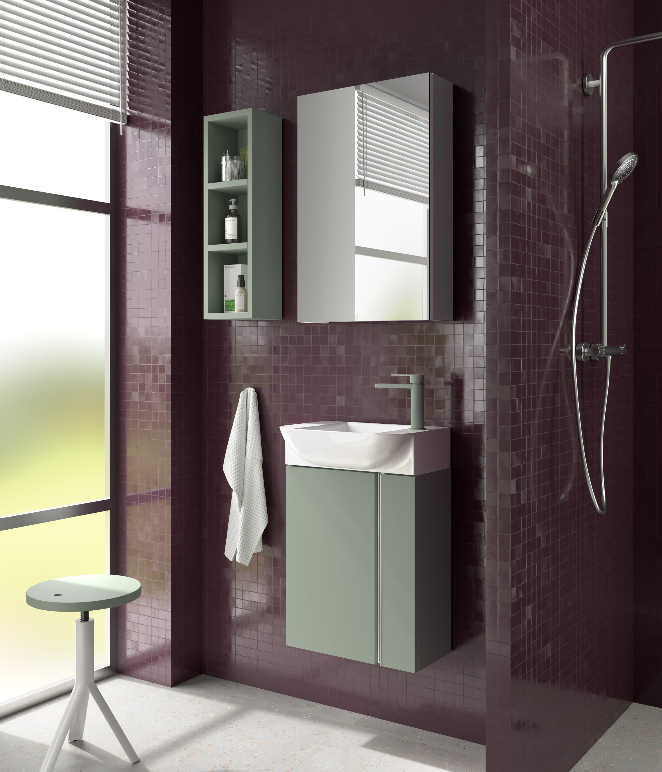 Sage green 450mm wall hung vanity unit with white basin in a plum mosaic tiled bathroom