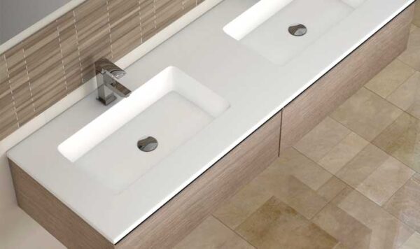 Overhead view of wide double inset basin on light wood-effect vanity unit