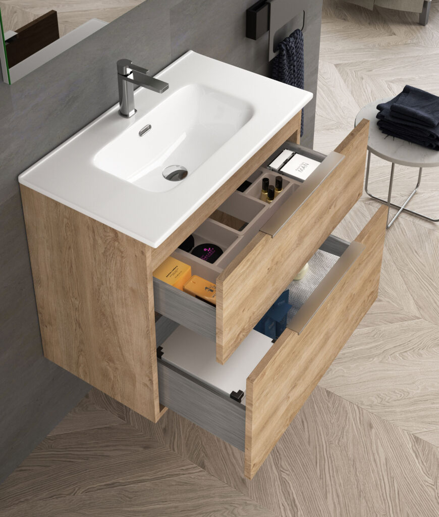 Oak wall hung vanity unit with two open drawers revealing organised storage compartments