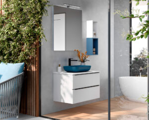 Matte white wall hung vanity unit with teal vessel basin and black tap in garden-view bathroom
