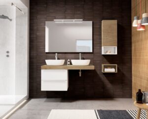 Double vessel basin setup on oak shelf with white drawer unit against dark wood-effect wall tiles
