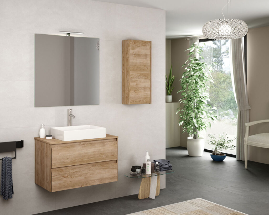 Natural oak vanity unit with white countertop basin, lit mirror and matching wall cabinet in a bright room