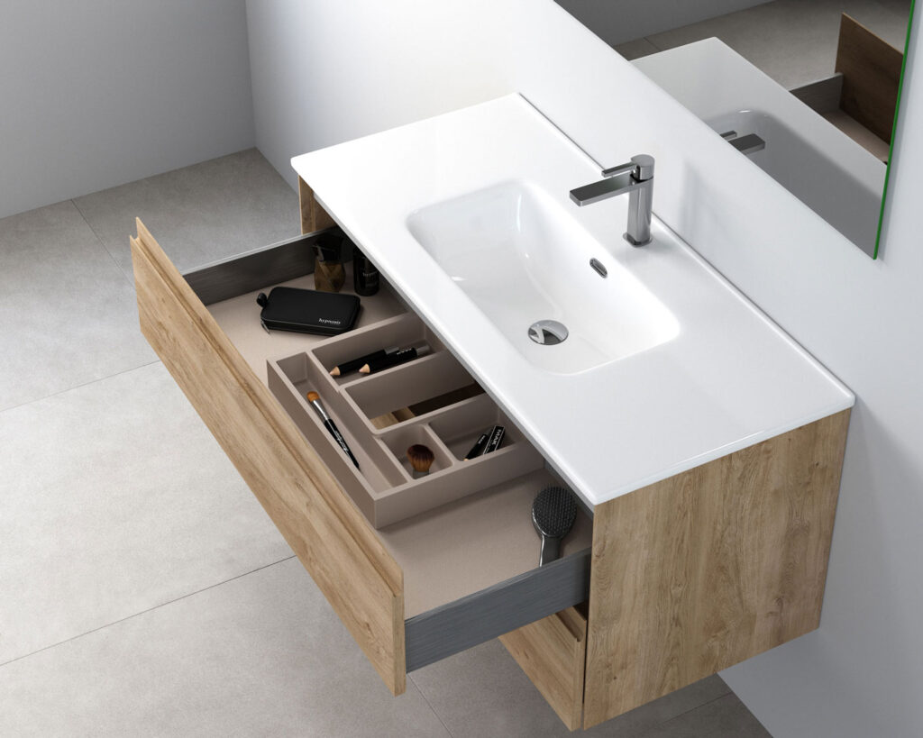 Oak wall hung vanity unit with open drawer revealing organised internal storage tray