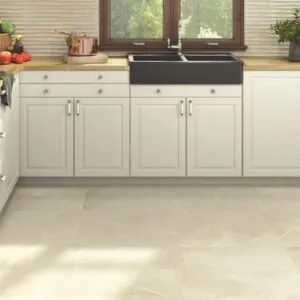 Cream marble-effect floor tiles in a bright white kitchen setting