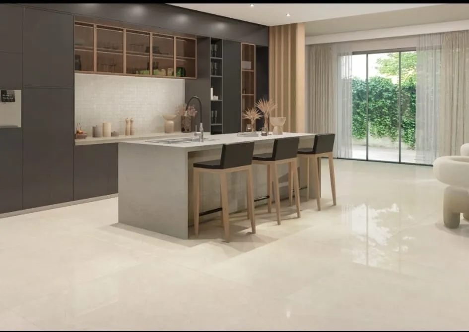 Polished ivory gloss floor tiles reflecting light in a modern kitchen with bar stools