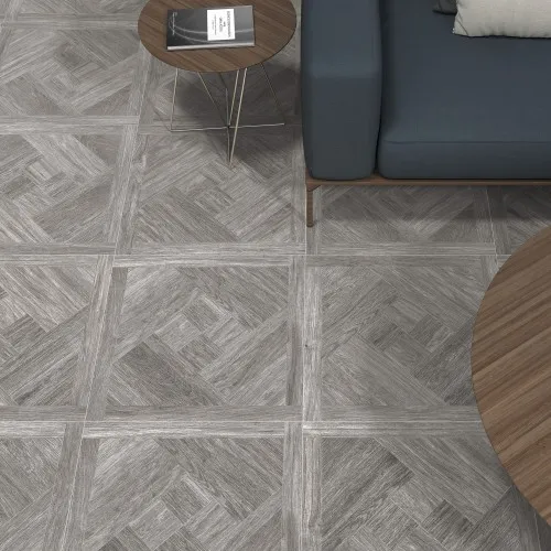 Grey wood-effect parquet-patterned floor tiles in a modern living room setting