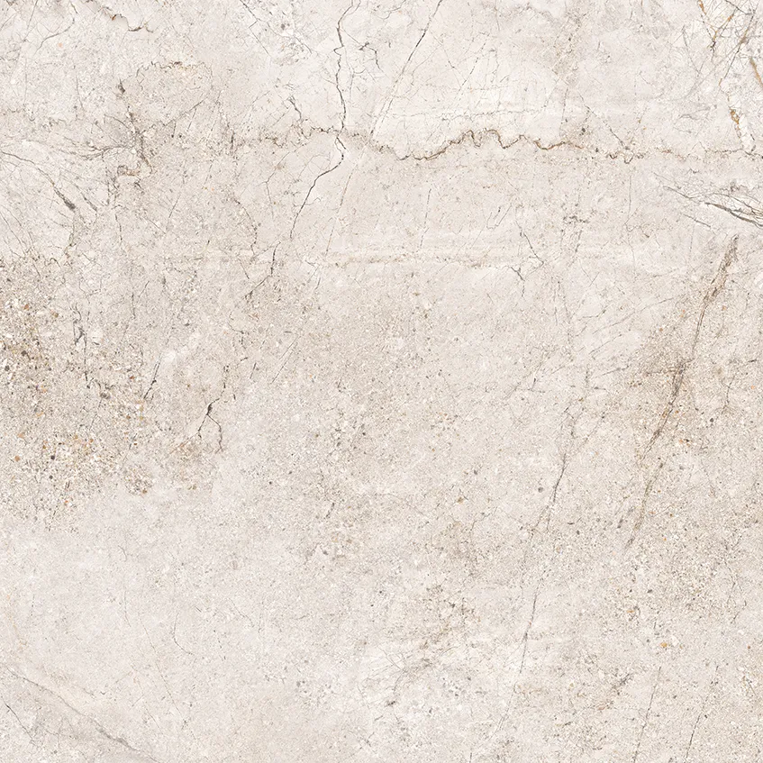 Close-up of beige porcelain tile with fine marble-style cracking and veining